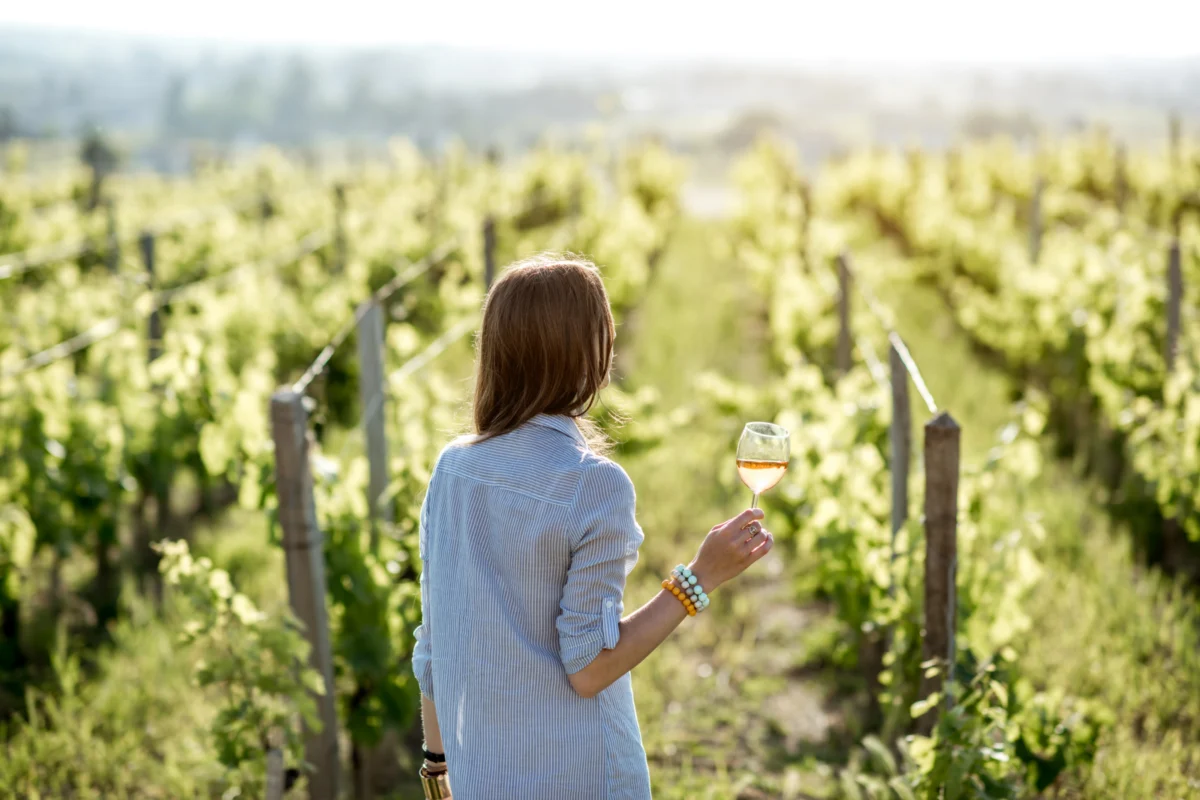 woman drinking wine at hill country winery